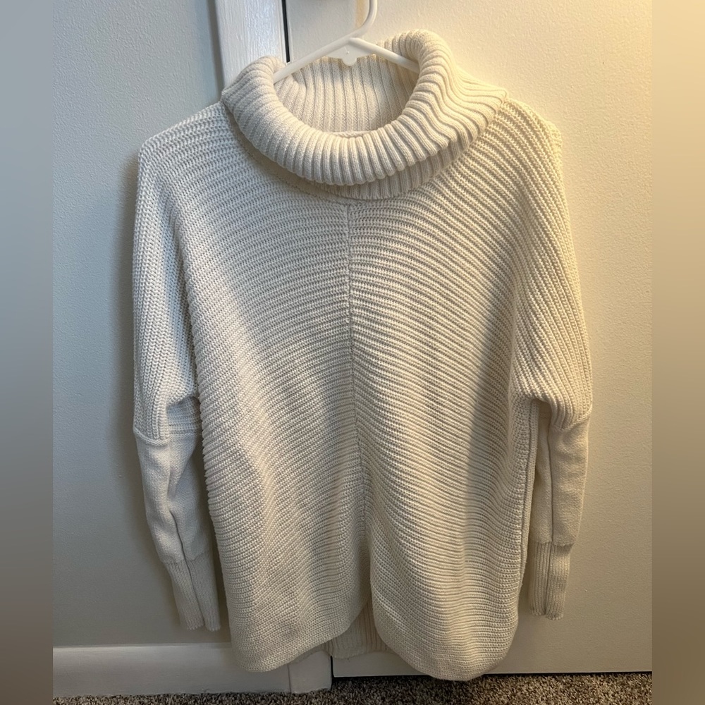 White turtleneck sweater